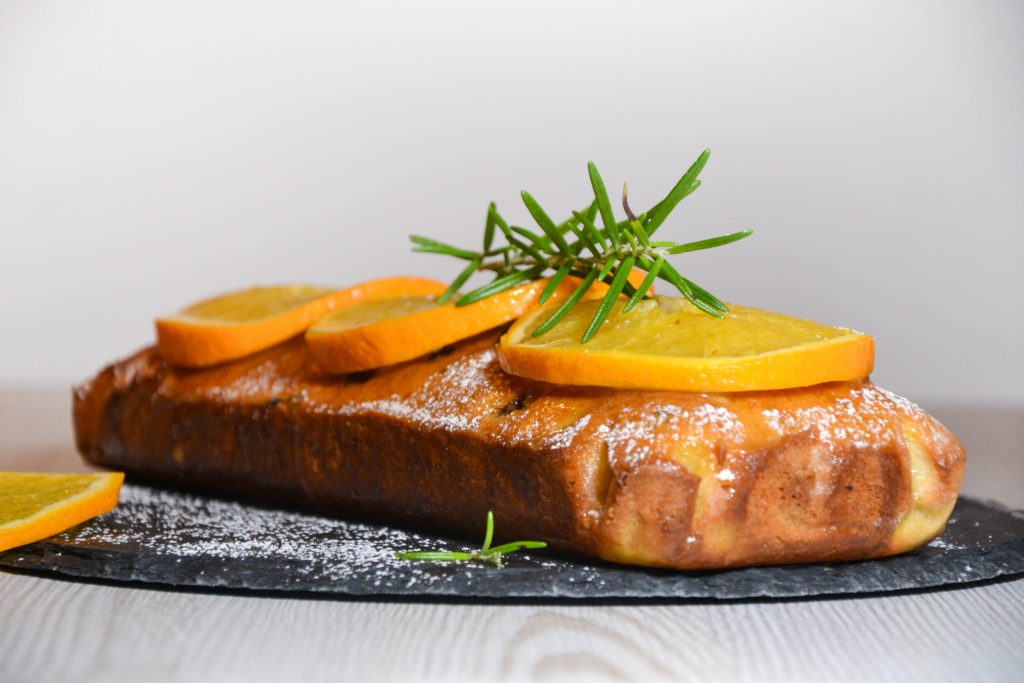 Lemon loaf with orange glaze and orange slices