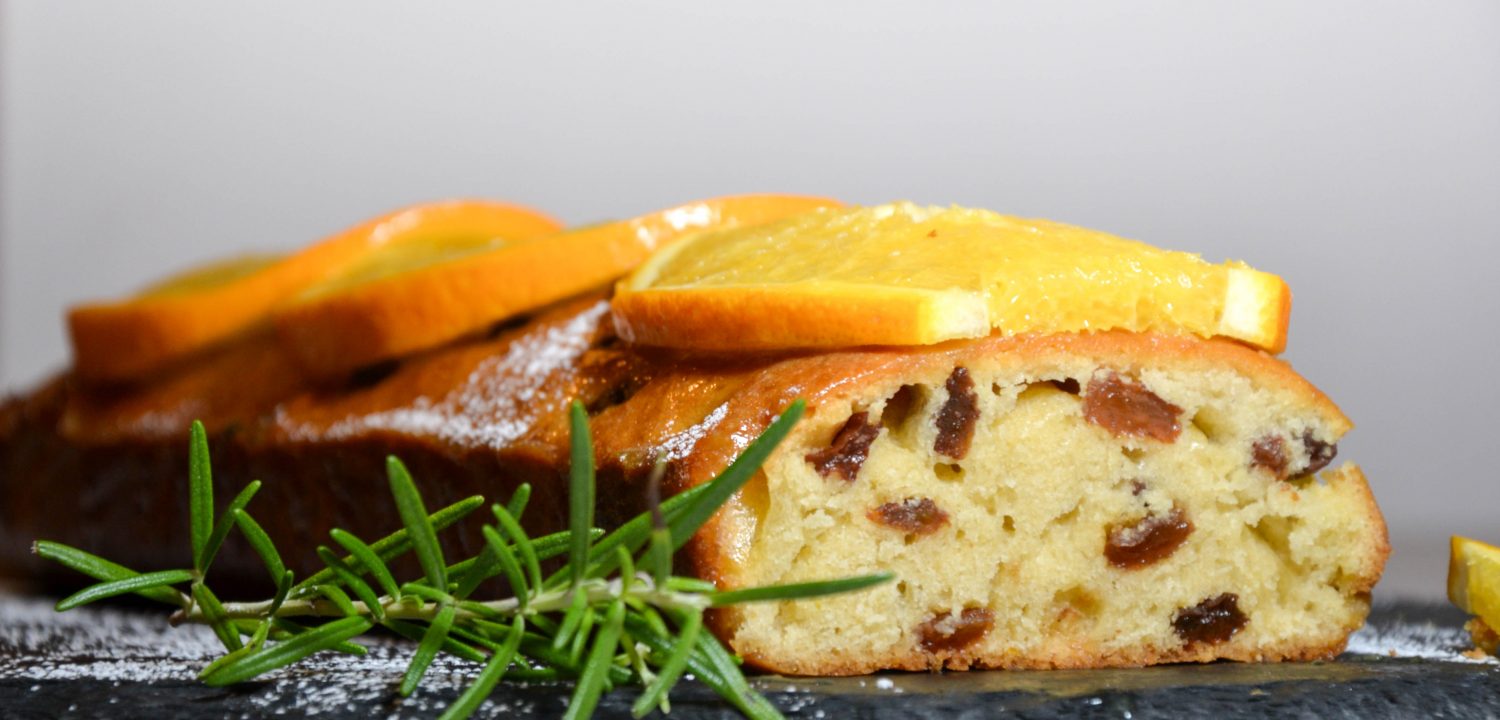 Lemon loaf with orange glaze and orange slices