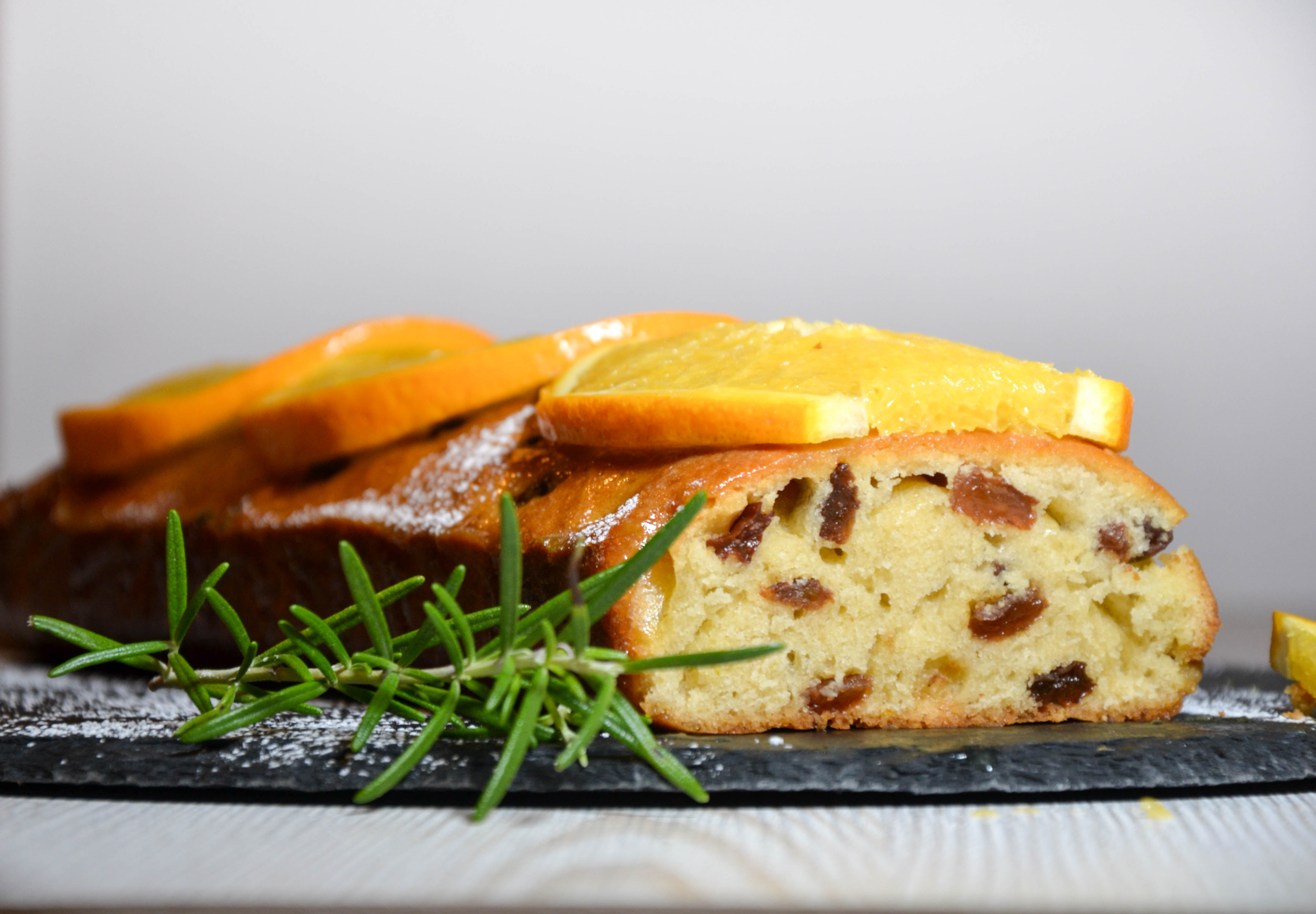 Lemon loaf with orange glaze and orange slices