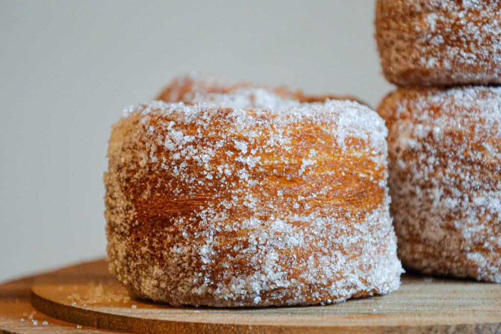 Homemade Cronuts with Sugar Topping and Orange Glaze