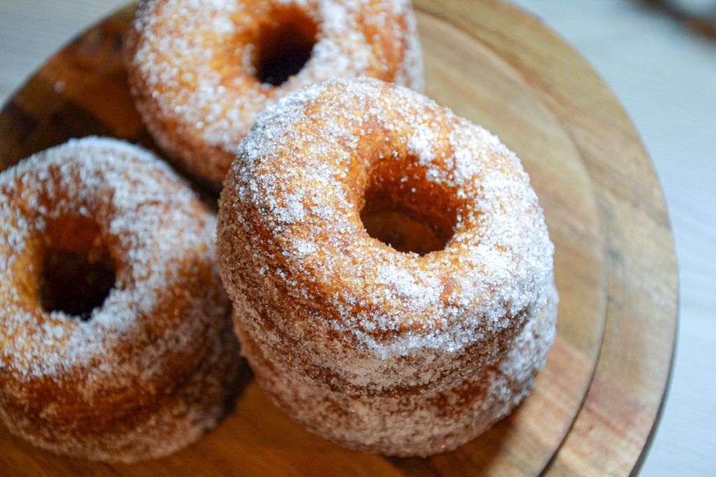 Homemade Cronuts with Sugar Topping and Orange Glaze